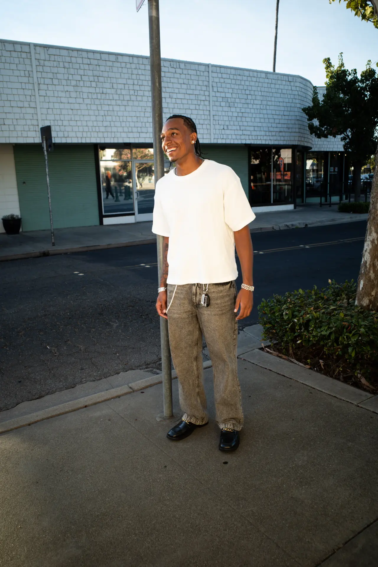Darrion Kelley, DJ D-Ron, standing outdoors in Stockton